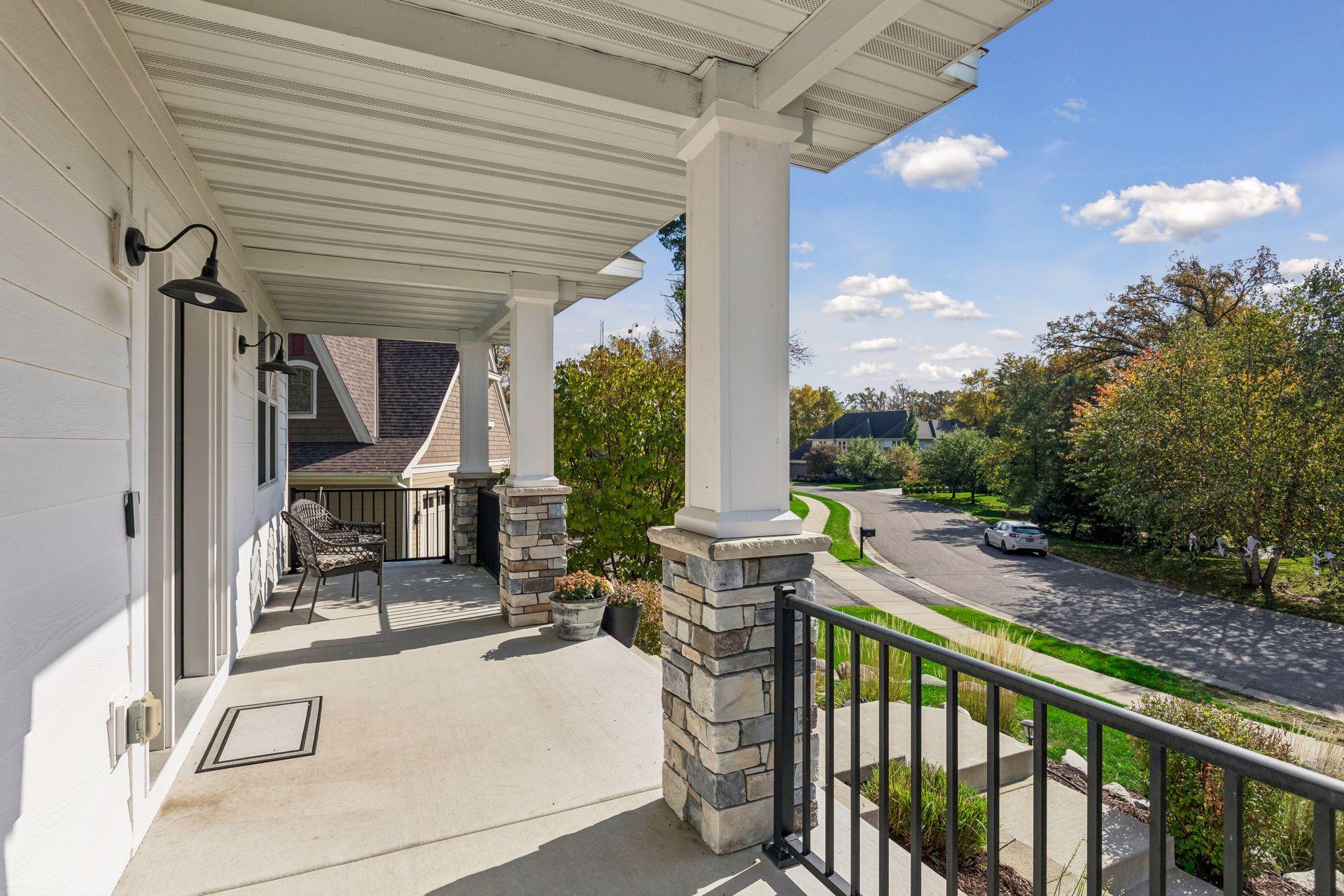 Spacious front porch offers a welcoming spot to relax and unwind.