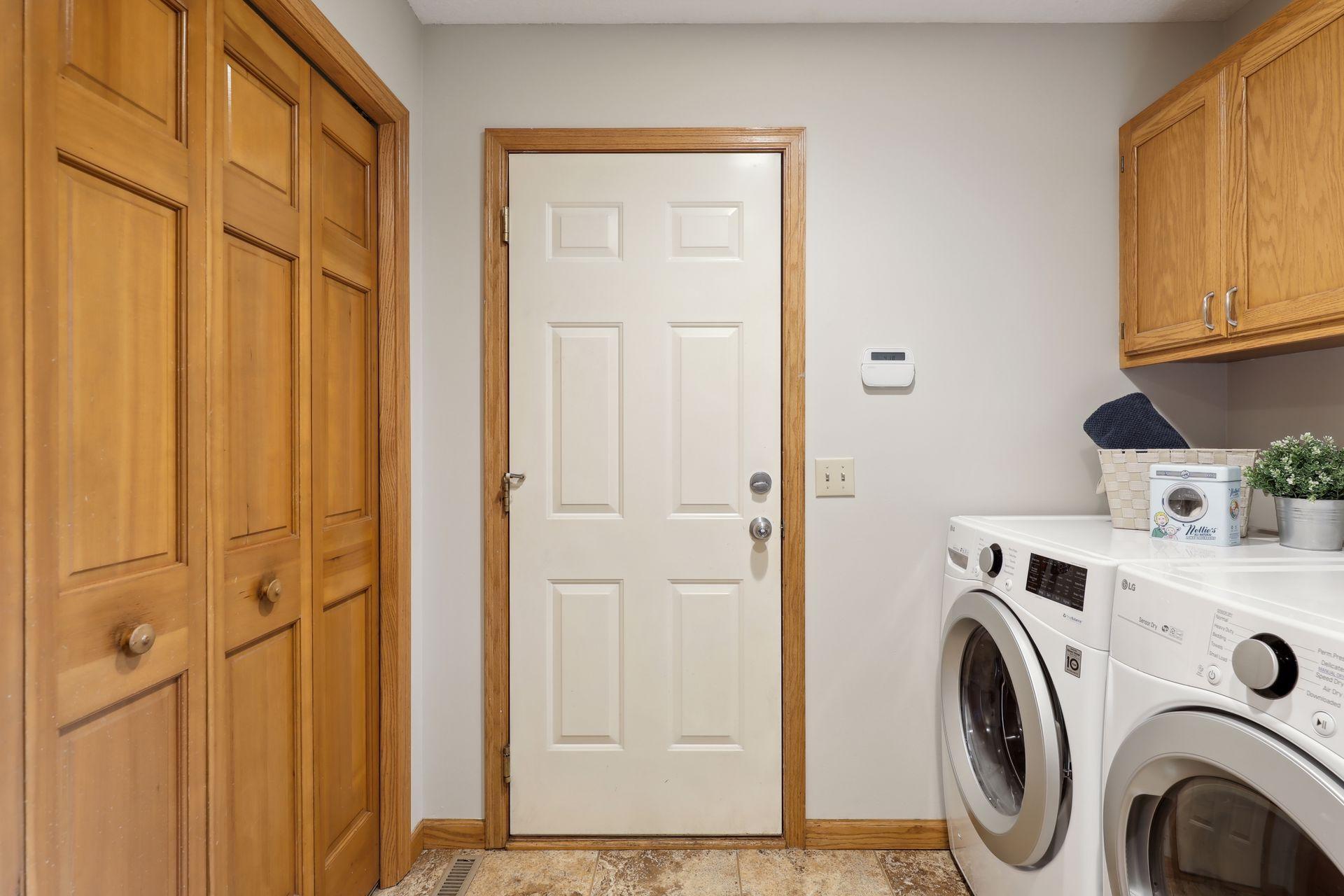 Laundry leads to 3-car garage