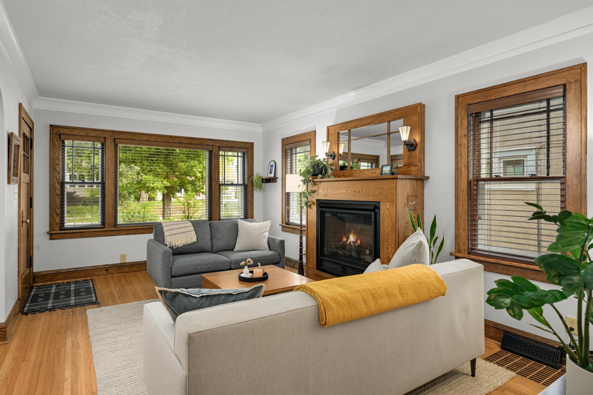 The living room gets great light through large windows
