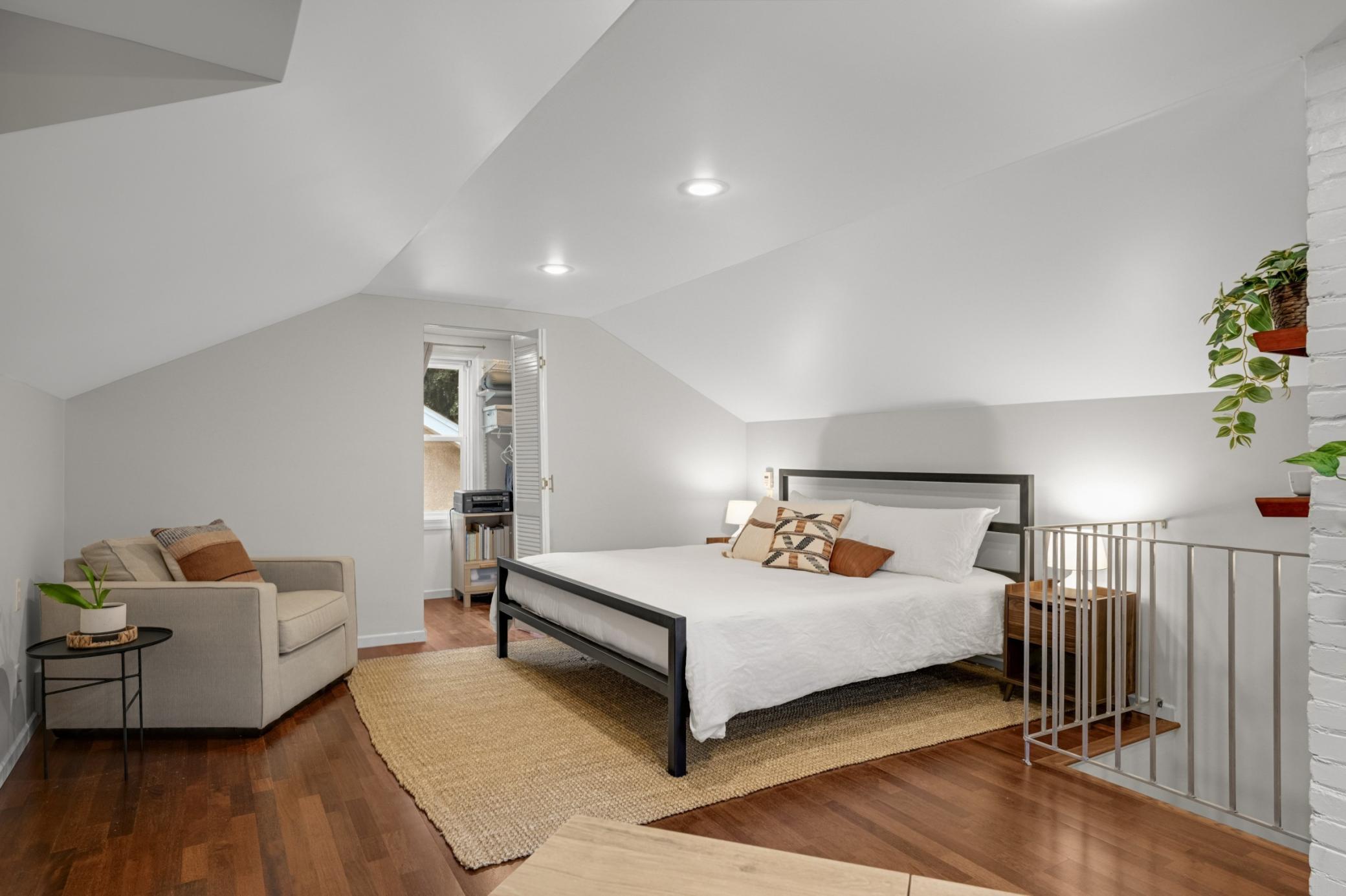 Upper level primary (3rd) bedroom with walk-in closet