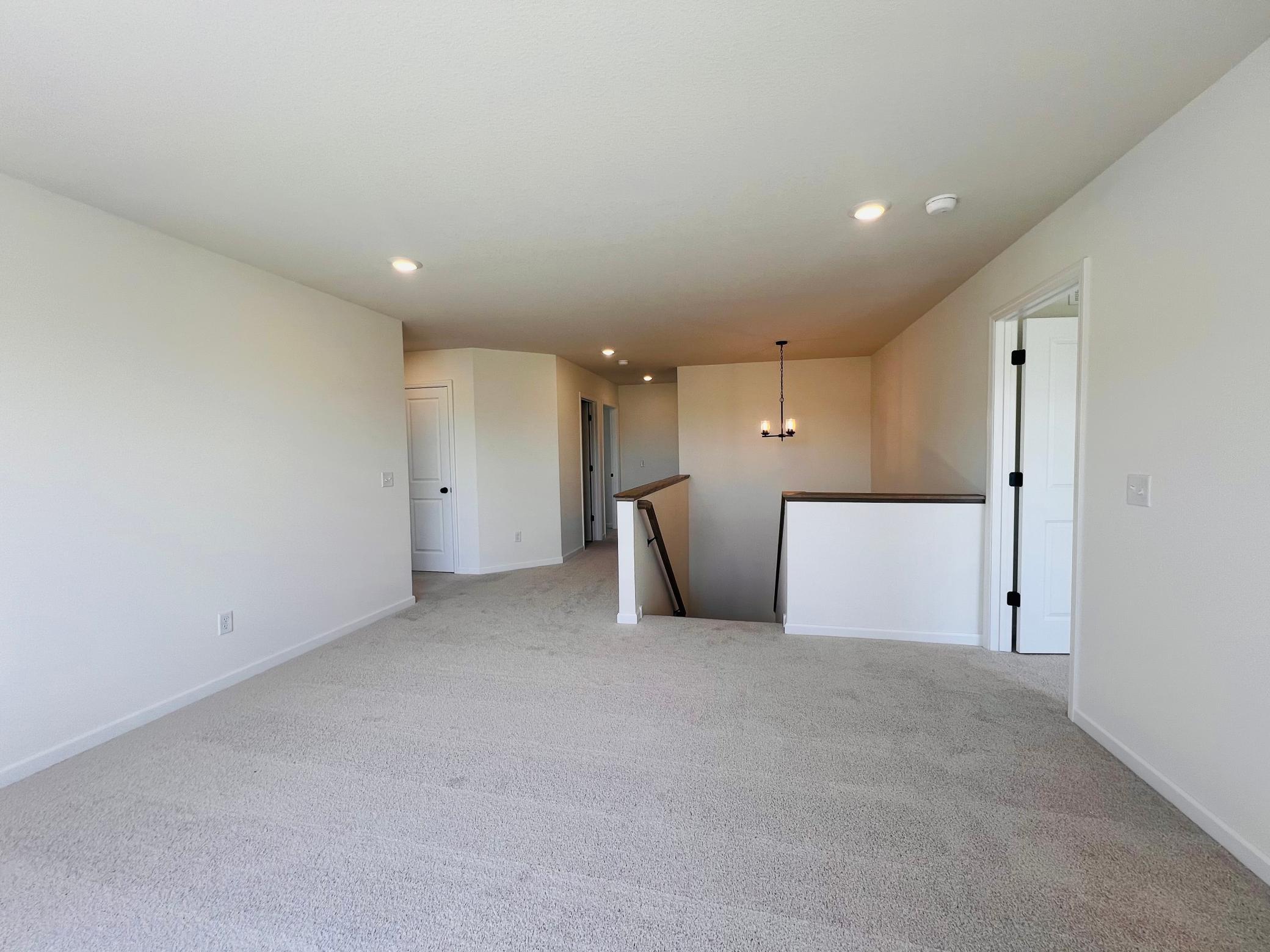 Upstairs Loft with 3 guest bedrooms, laundry room and bath. All Pictures are for Illustration Only.