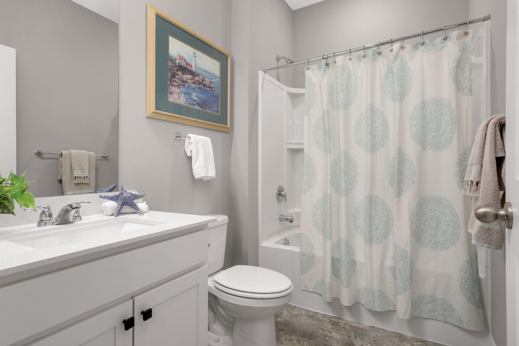 The additional full guest bathroom.