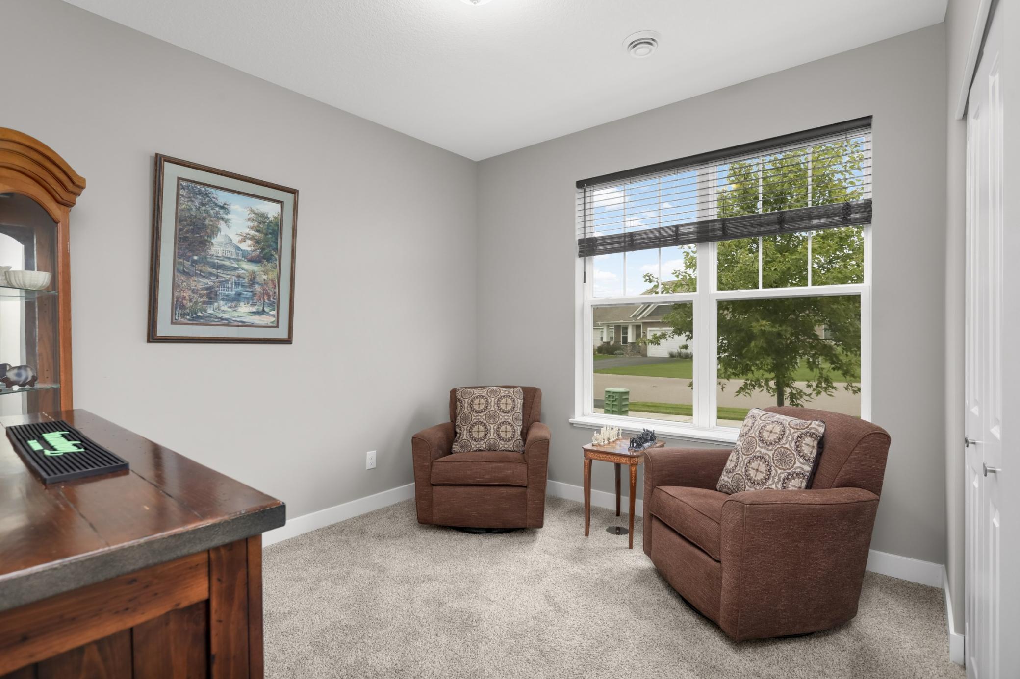 The front bedroom, currently used as a sitting room.