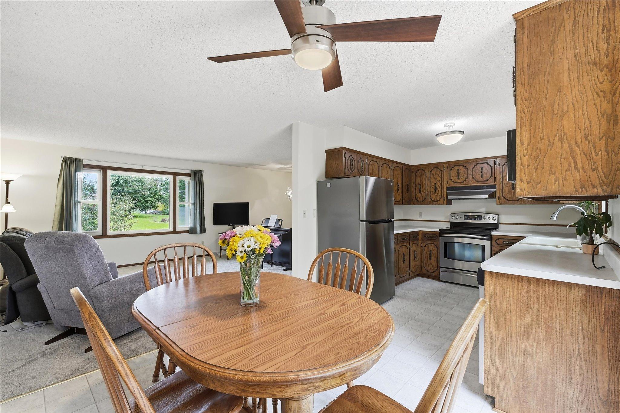Open kitchen and dining area flows easily into the living room, creating a functional layout for everyday living and entertaining.