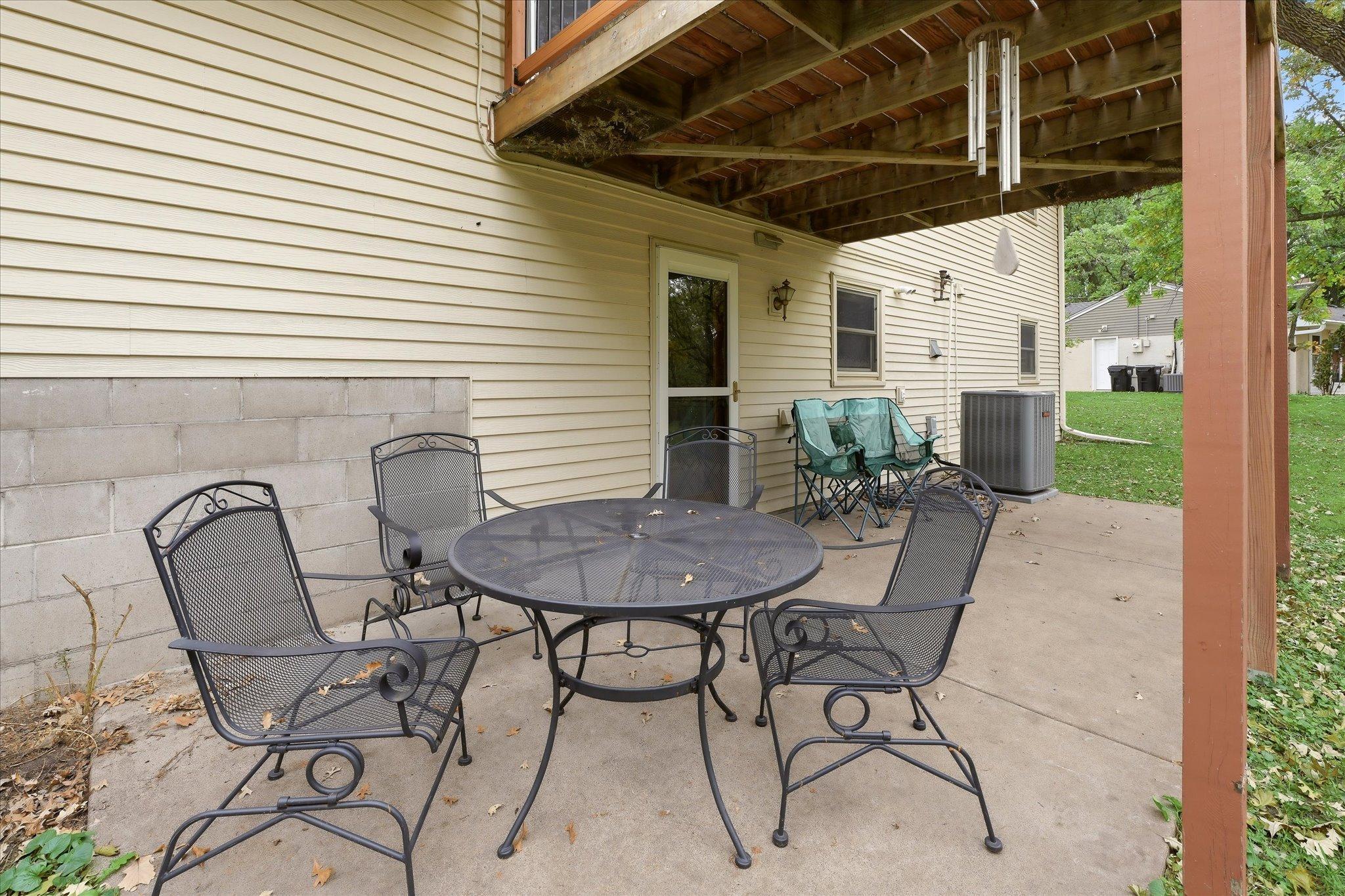 The lower-level kitchen and laundry area walks directly out to a private patio creating a convenient outdoor living space and adding even more flexibility for a potential renter or extended living arrangement.