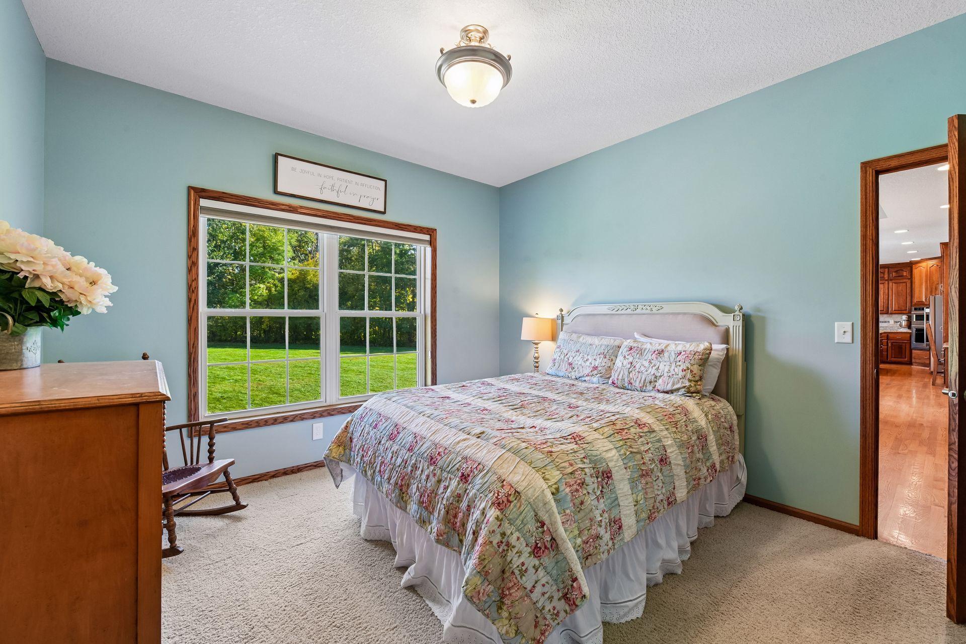 Tucked away on the main level is a Guest Bedroom suite featuring a walk-in closet and private bathroom.
