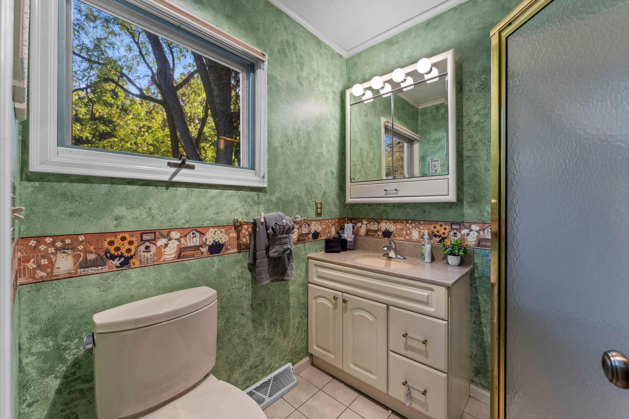 Main Level Bathroom with a Shower