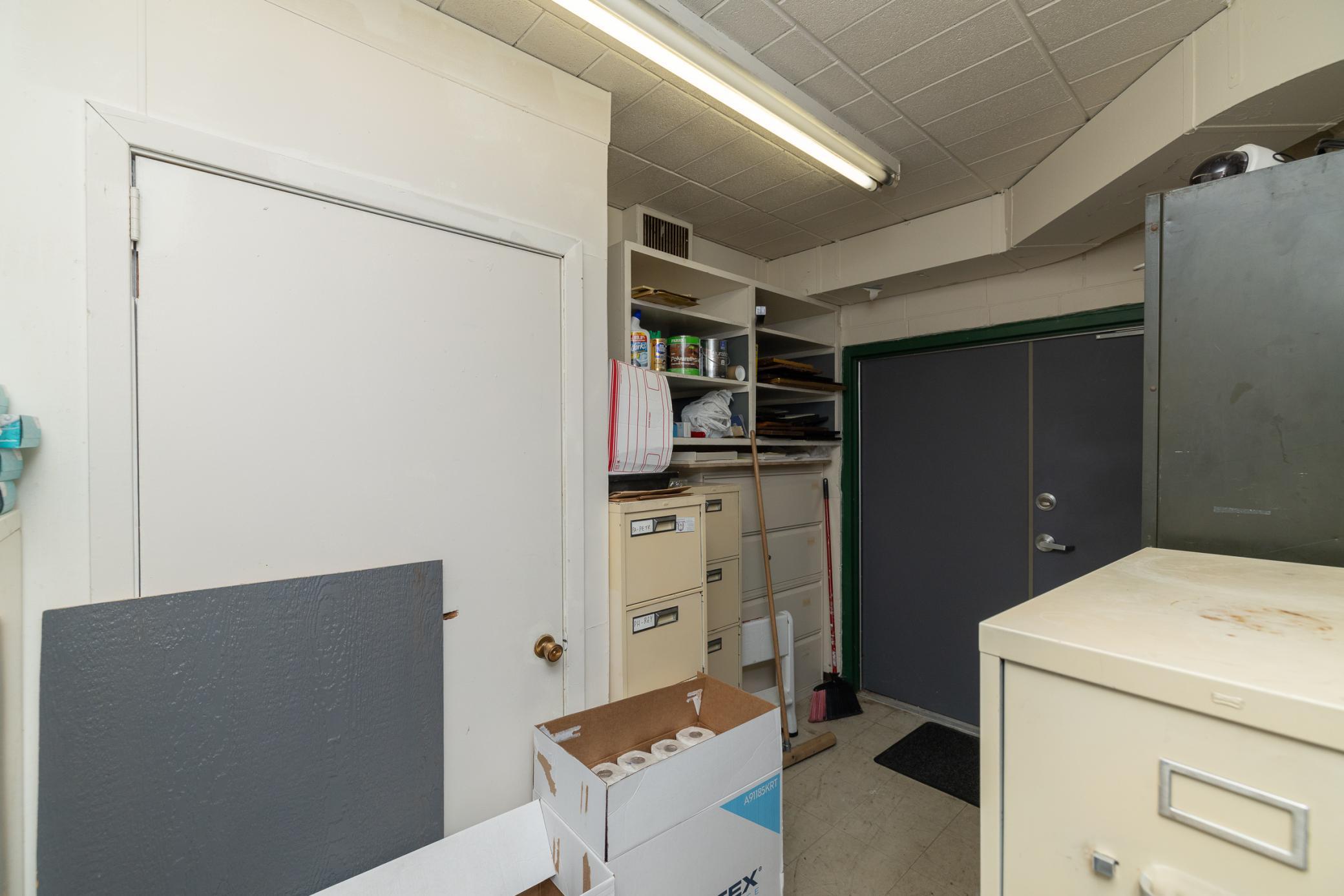 Back of Building Storage Area With Doors in Back for Deliveries
