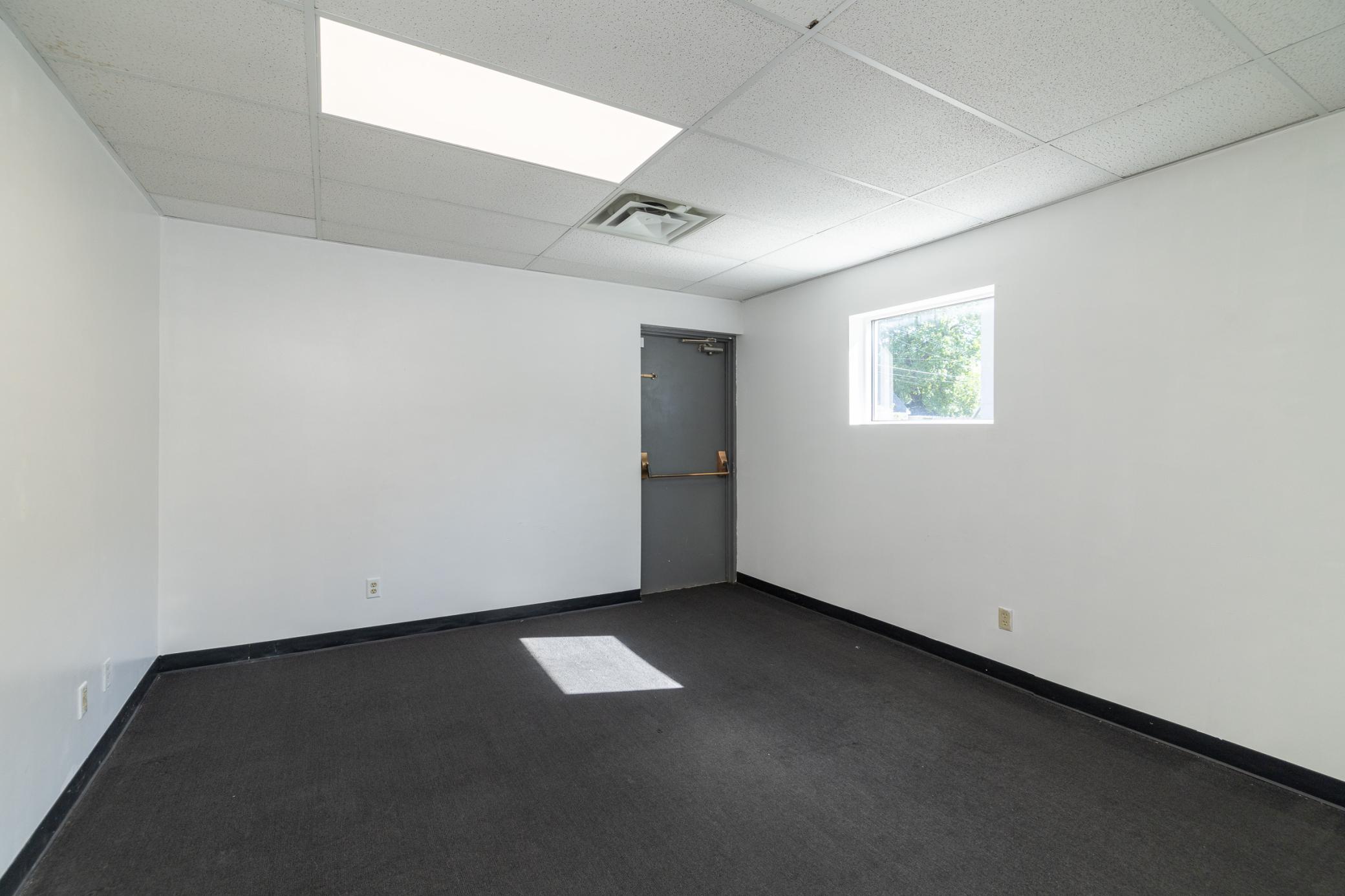 South Side Private Office With Direct Access to Back of Building.