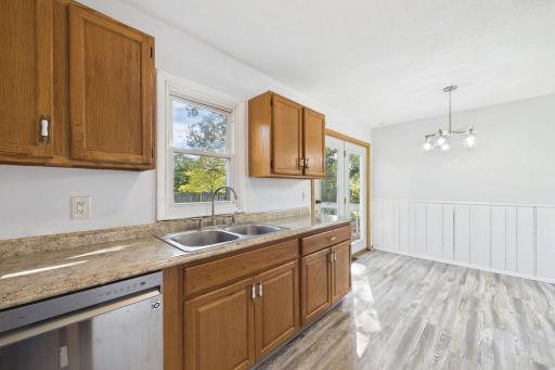 Sun-drenched, open-concept kitchen radiating with abundant natural light.