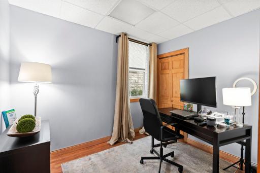 Main level bedroom that doubles as an office
