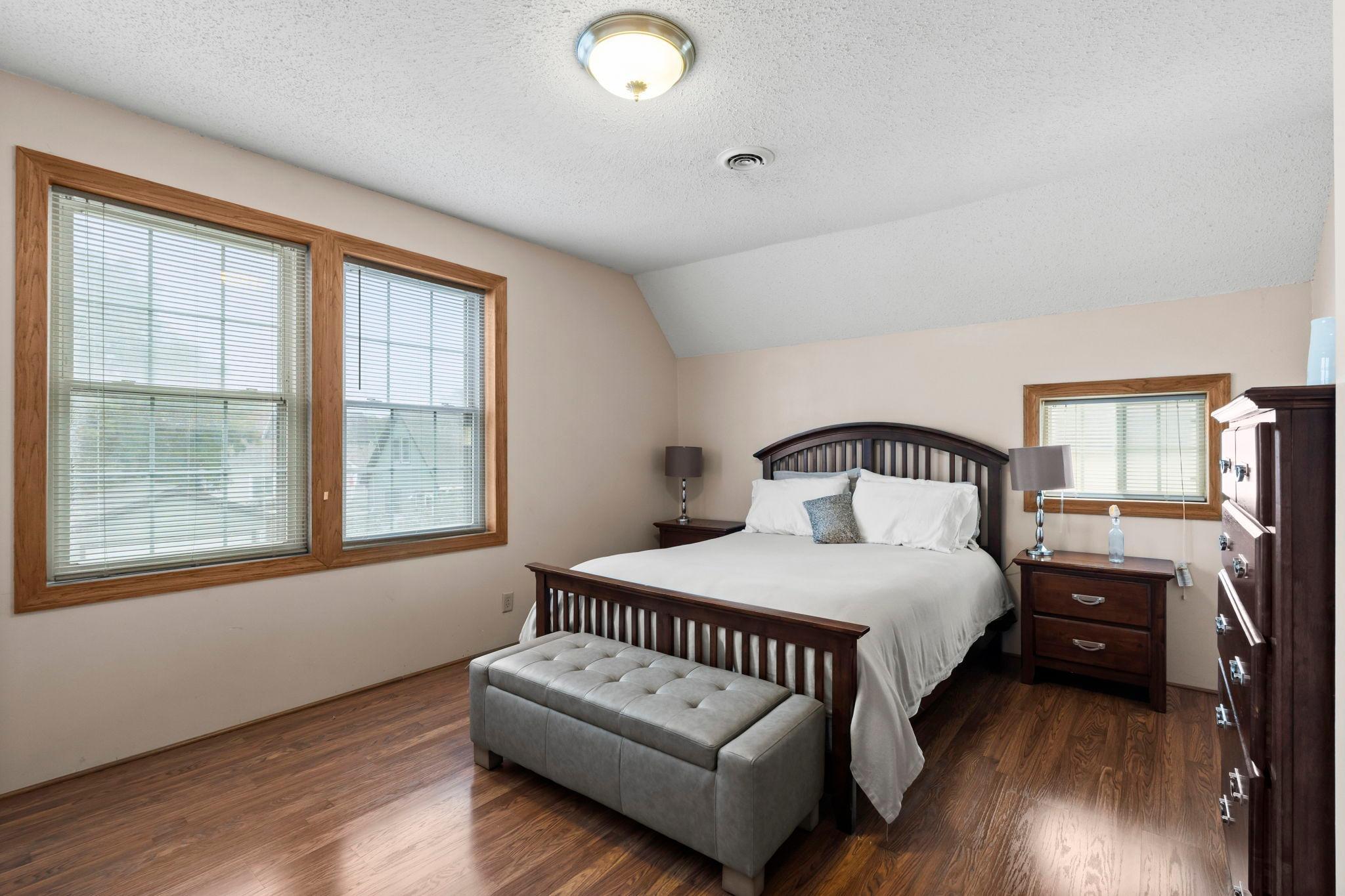 Spacious primary bedroom upper level