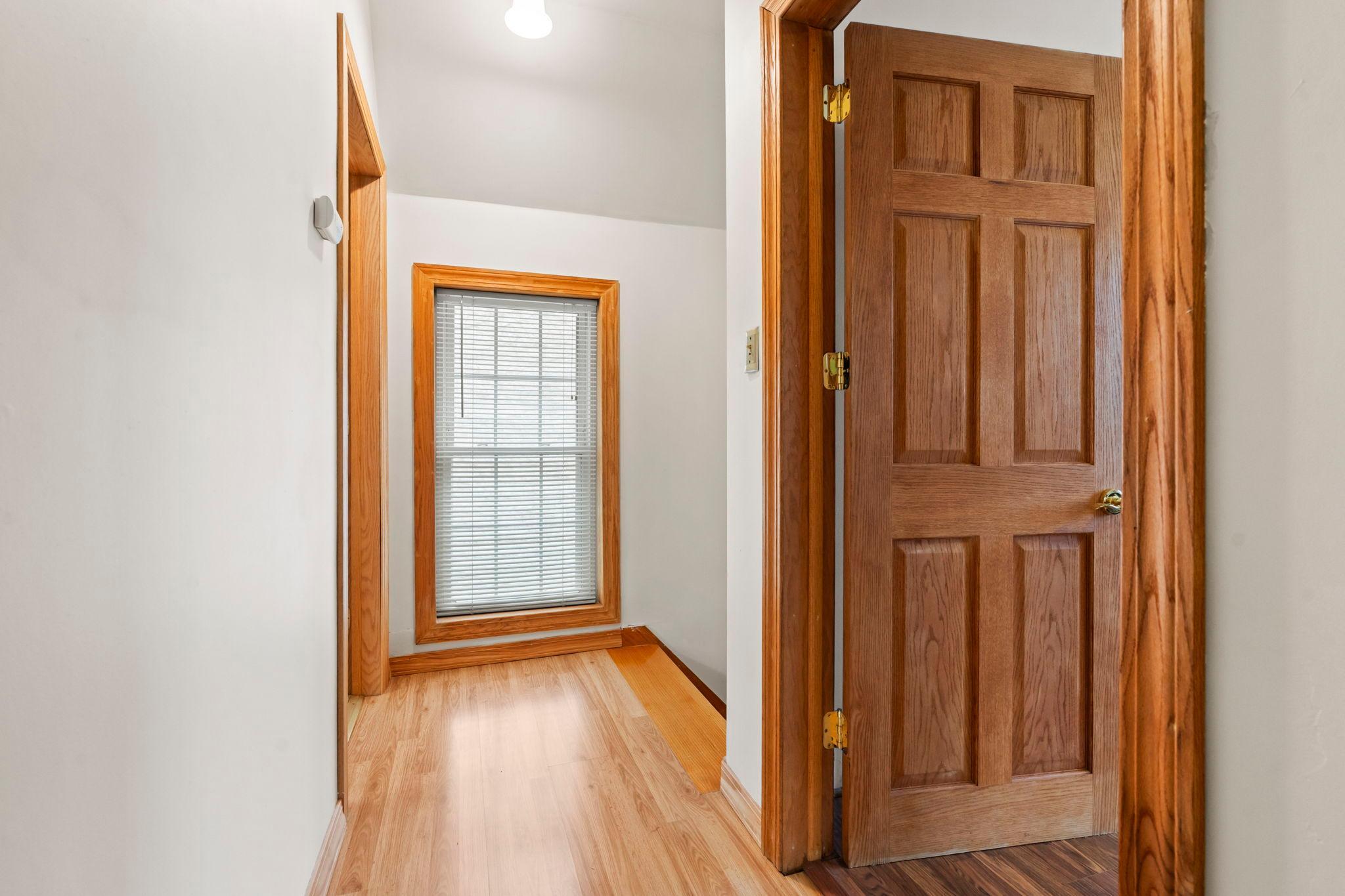 Upper level hallway. All solid paneled doors