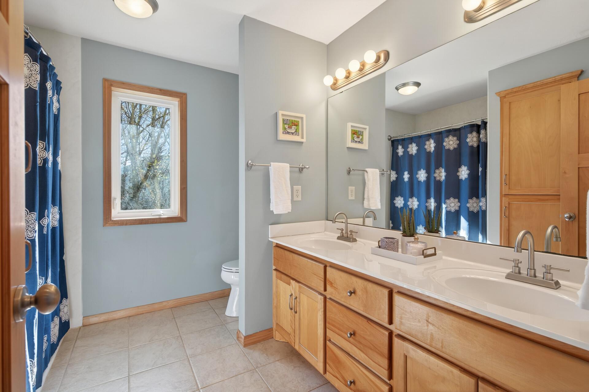 Upper Full bath with double vanity