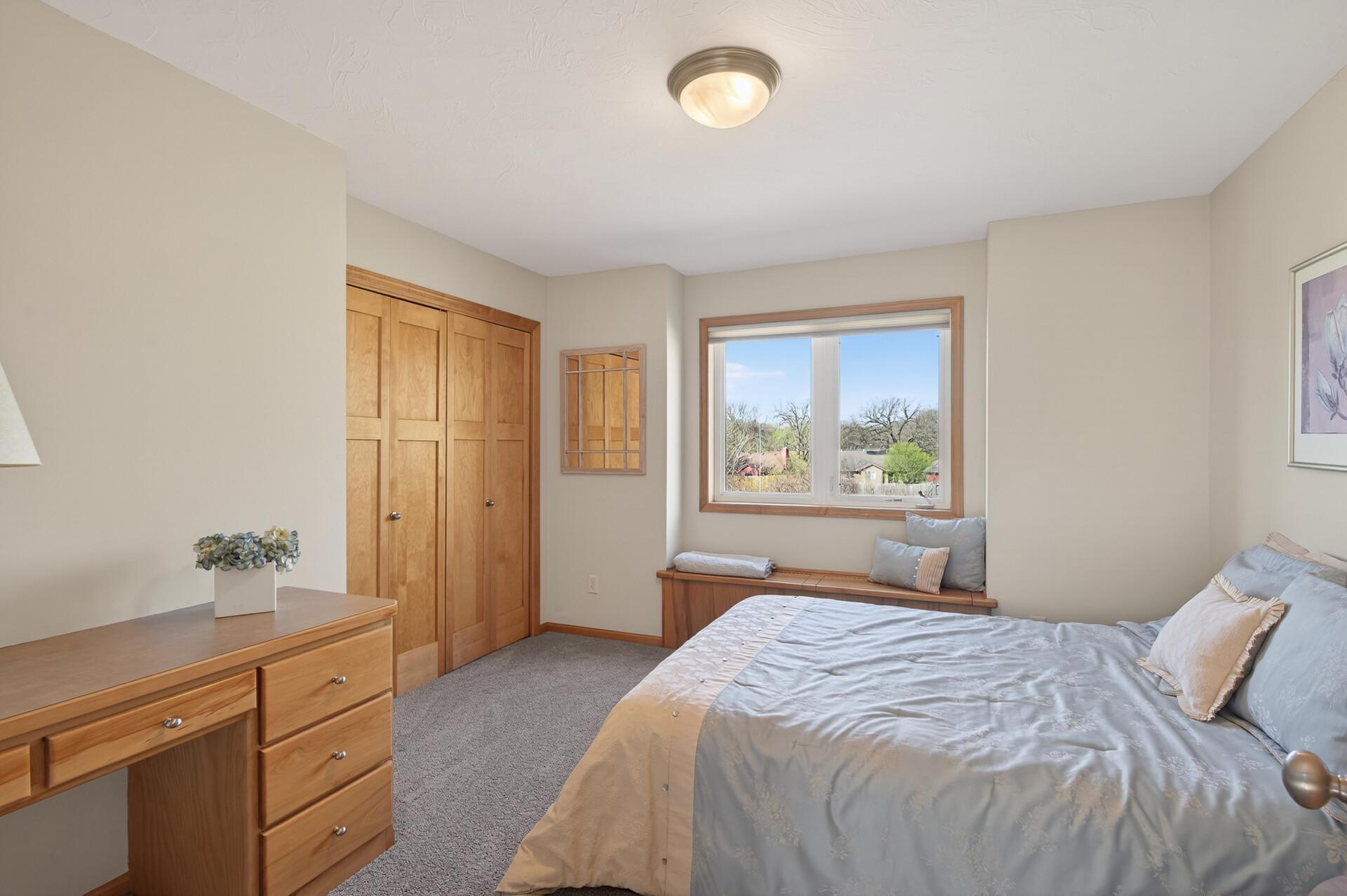 Bedroom 4 with built-in desk and Window seat