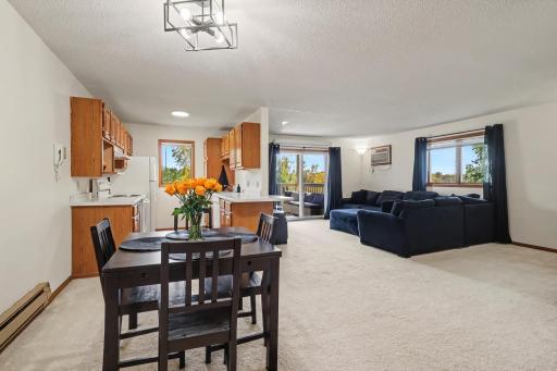 Spacious dining room, providing ample space for family meals and easy kitchen access
