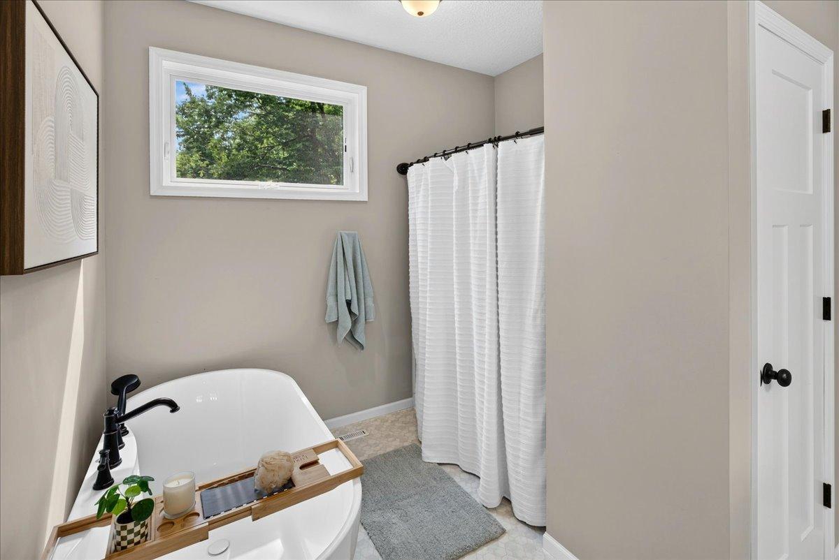 Primary Bath with Tub & Shower.