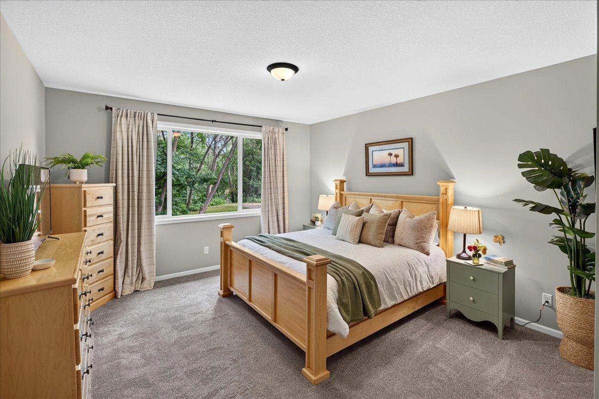 Primary Bedroom with wooded views.