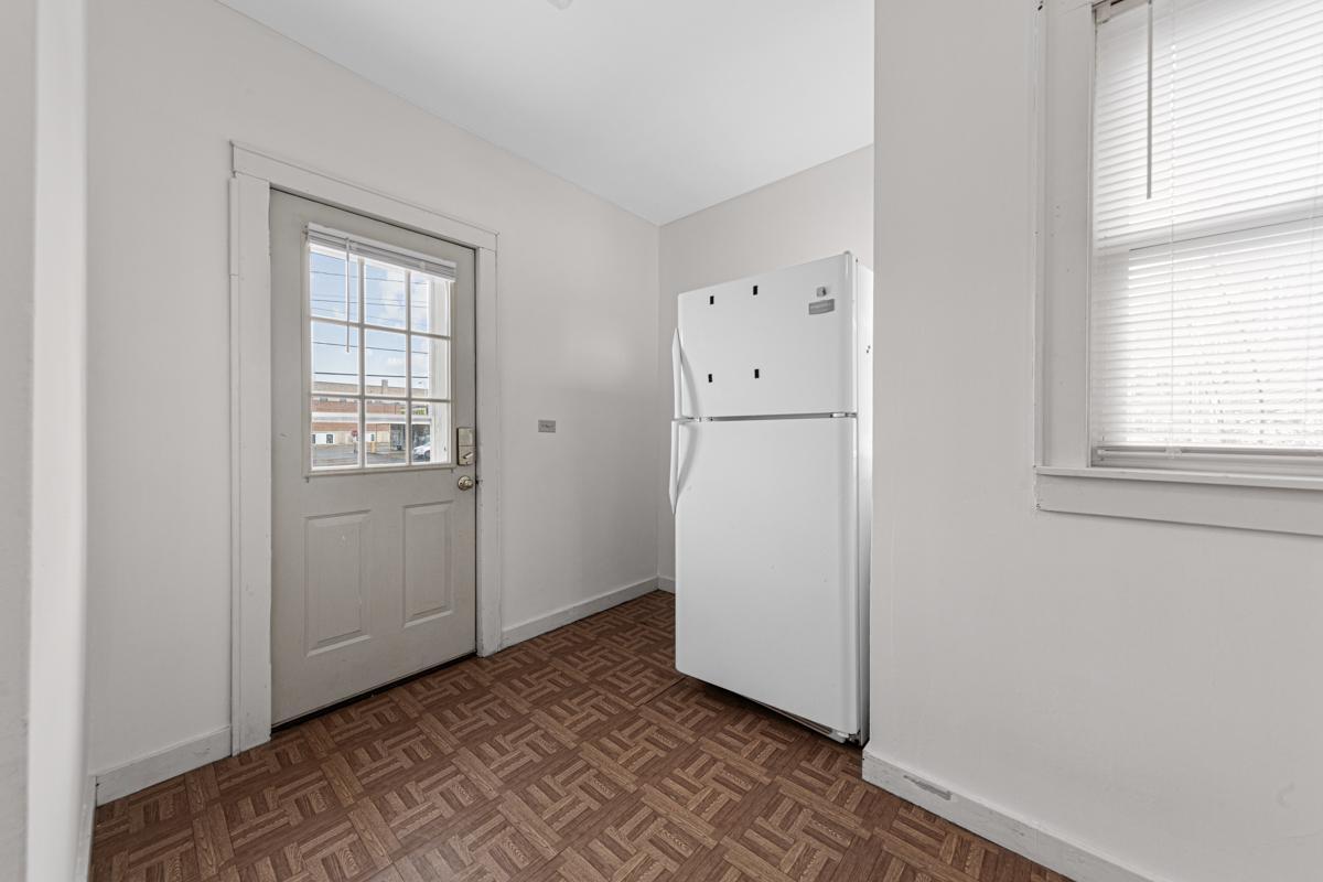 25 Kitchen_back entry_apt 1.jpg