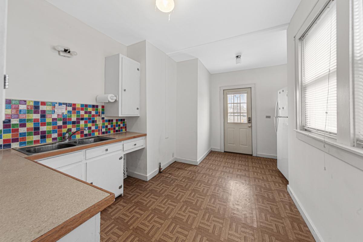 24 Kitchen_back entry_apt 1.jpg