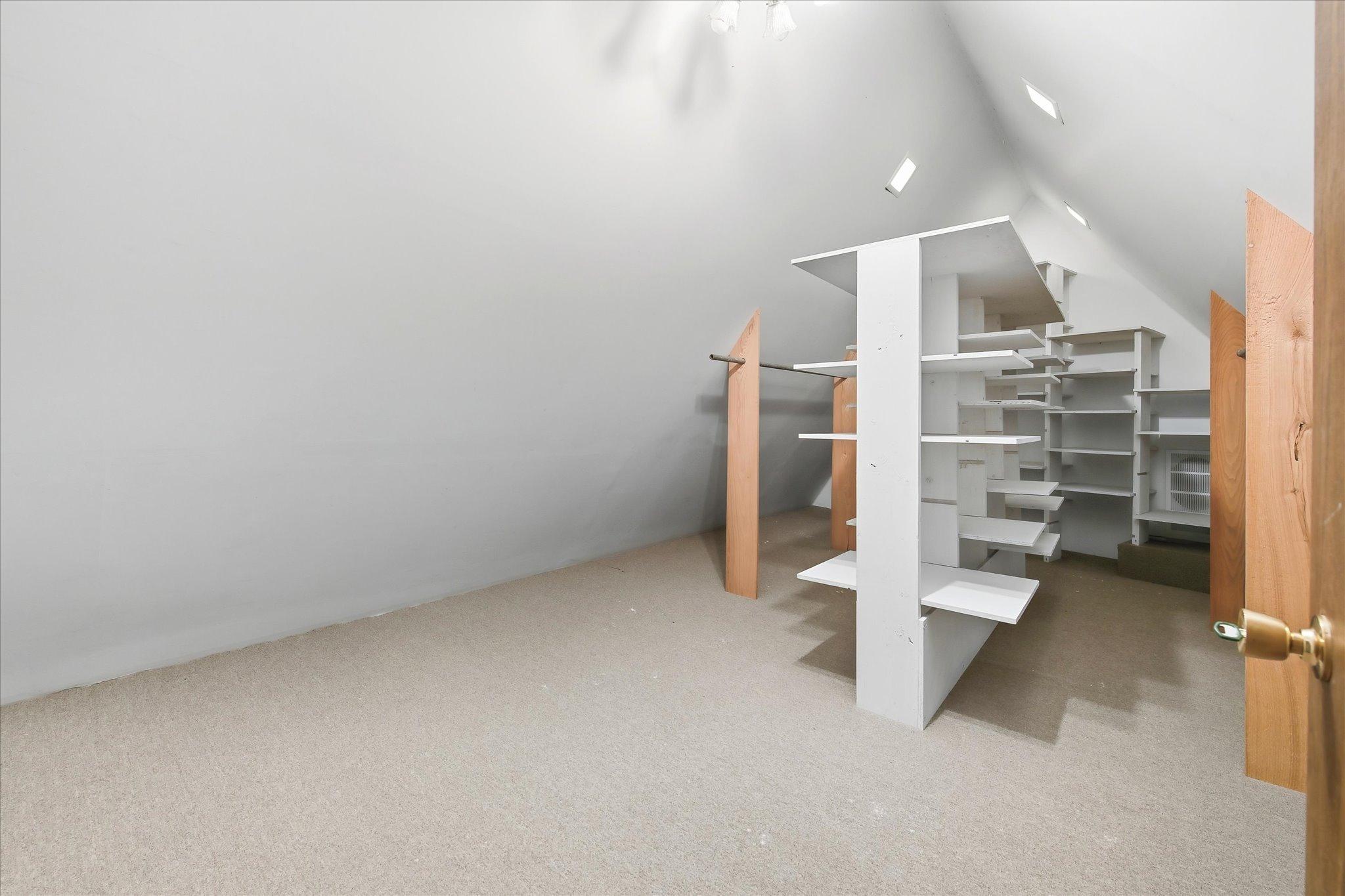 Walk-in closet in the primary