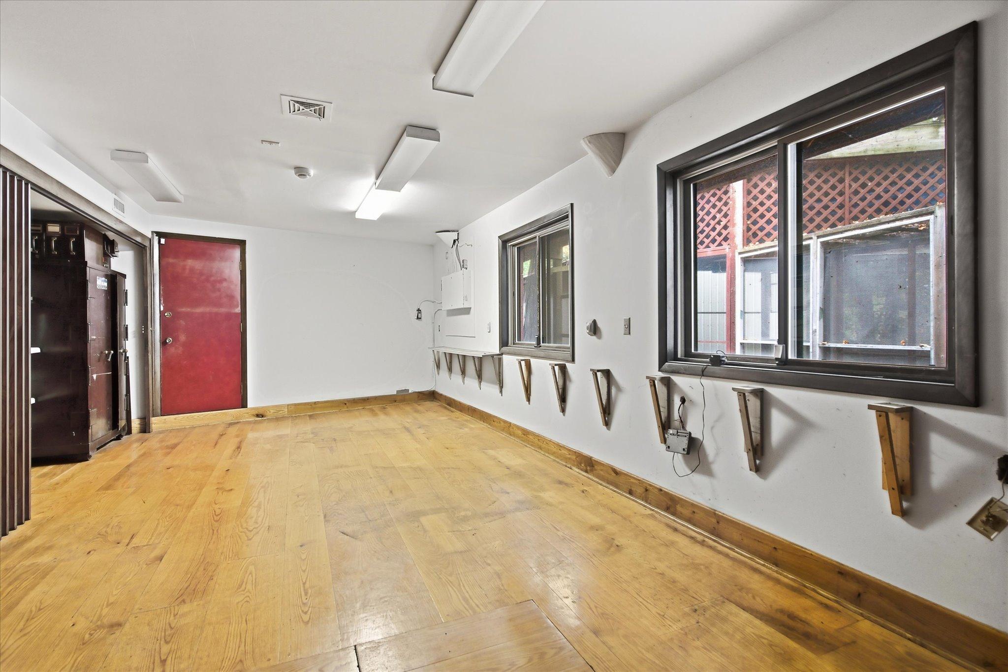 Main floor office looks out to the river and has an entry into the 3 car attached garage