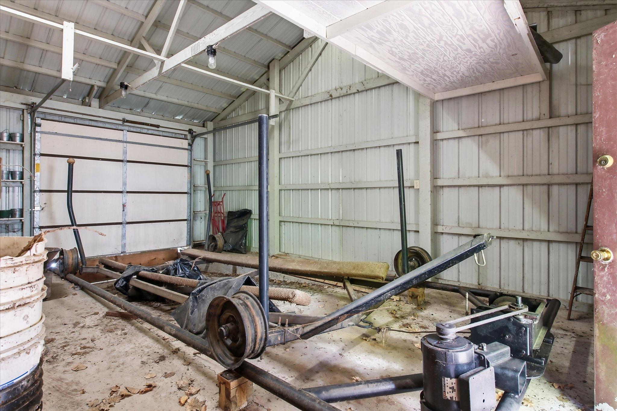 Pole barn with overhead door to on the river side