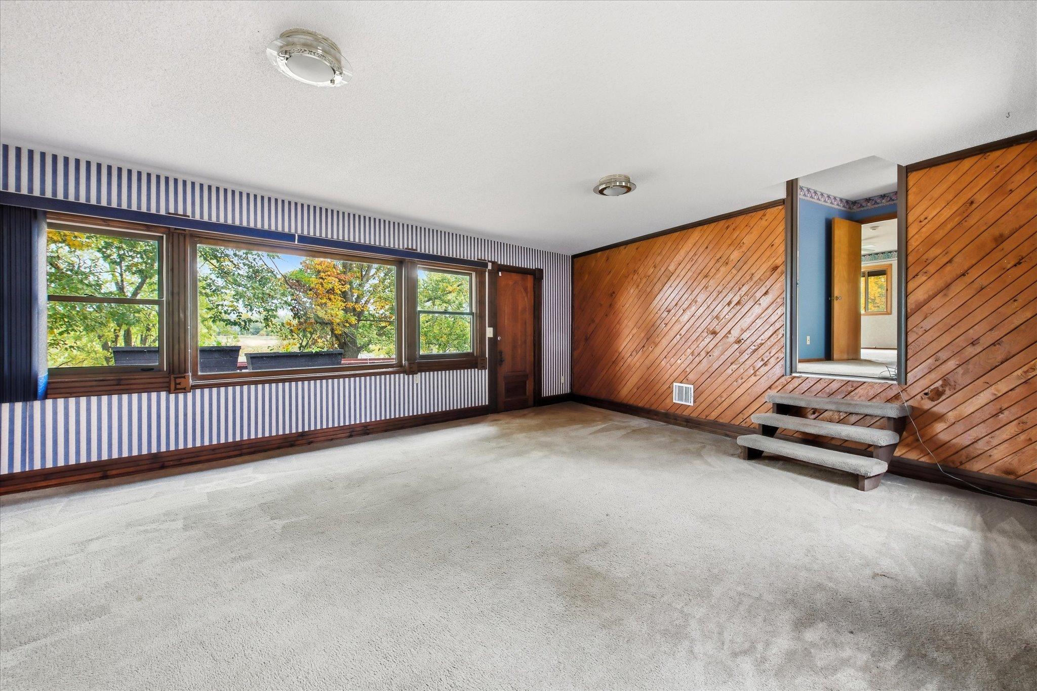 Main floor family room looks out to the river