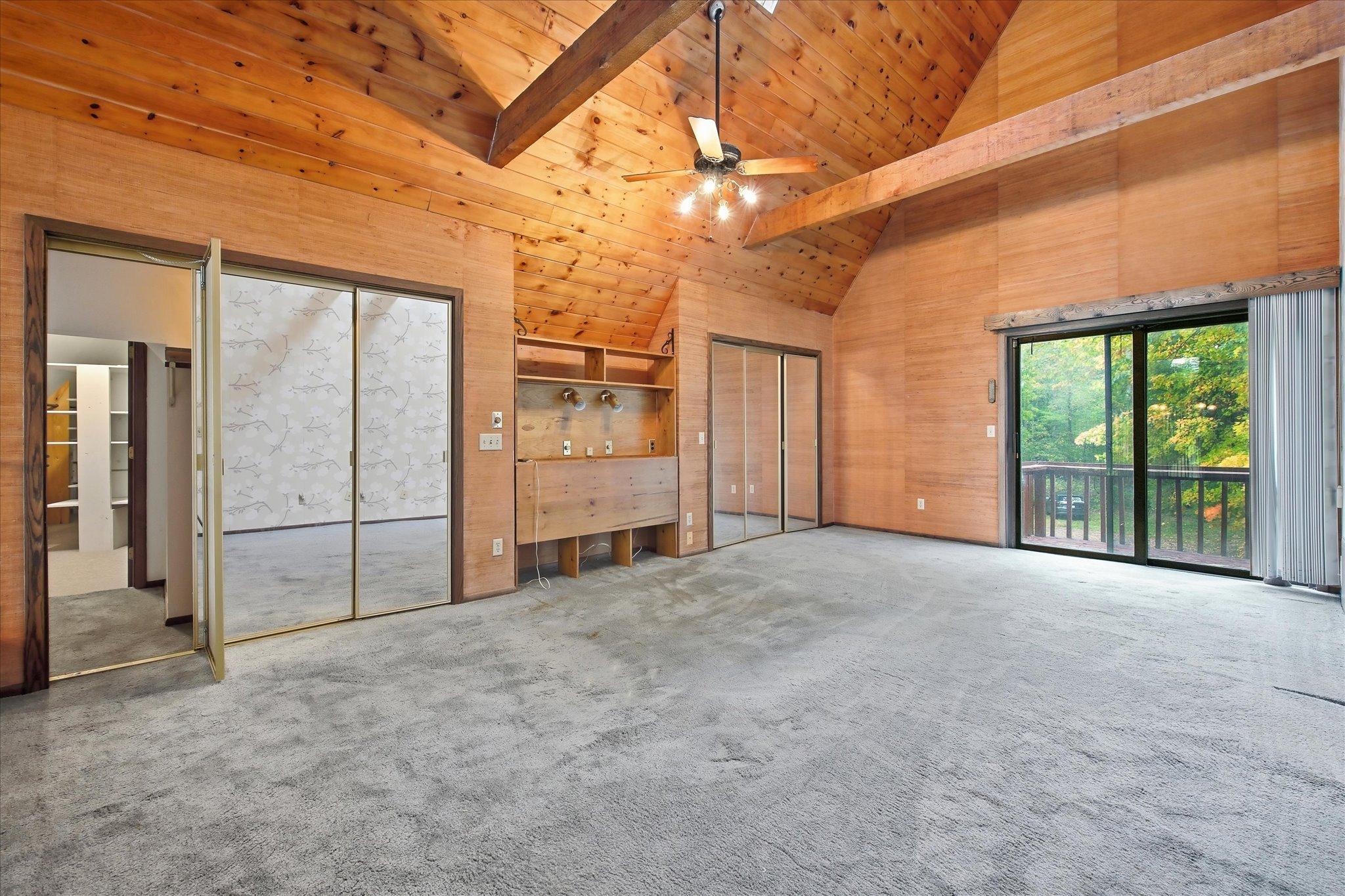 Vaulted ceiling in the primary with double closets and a walk-in closet