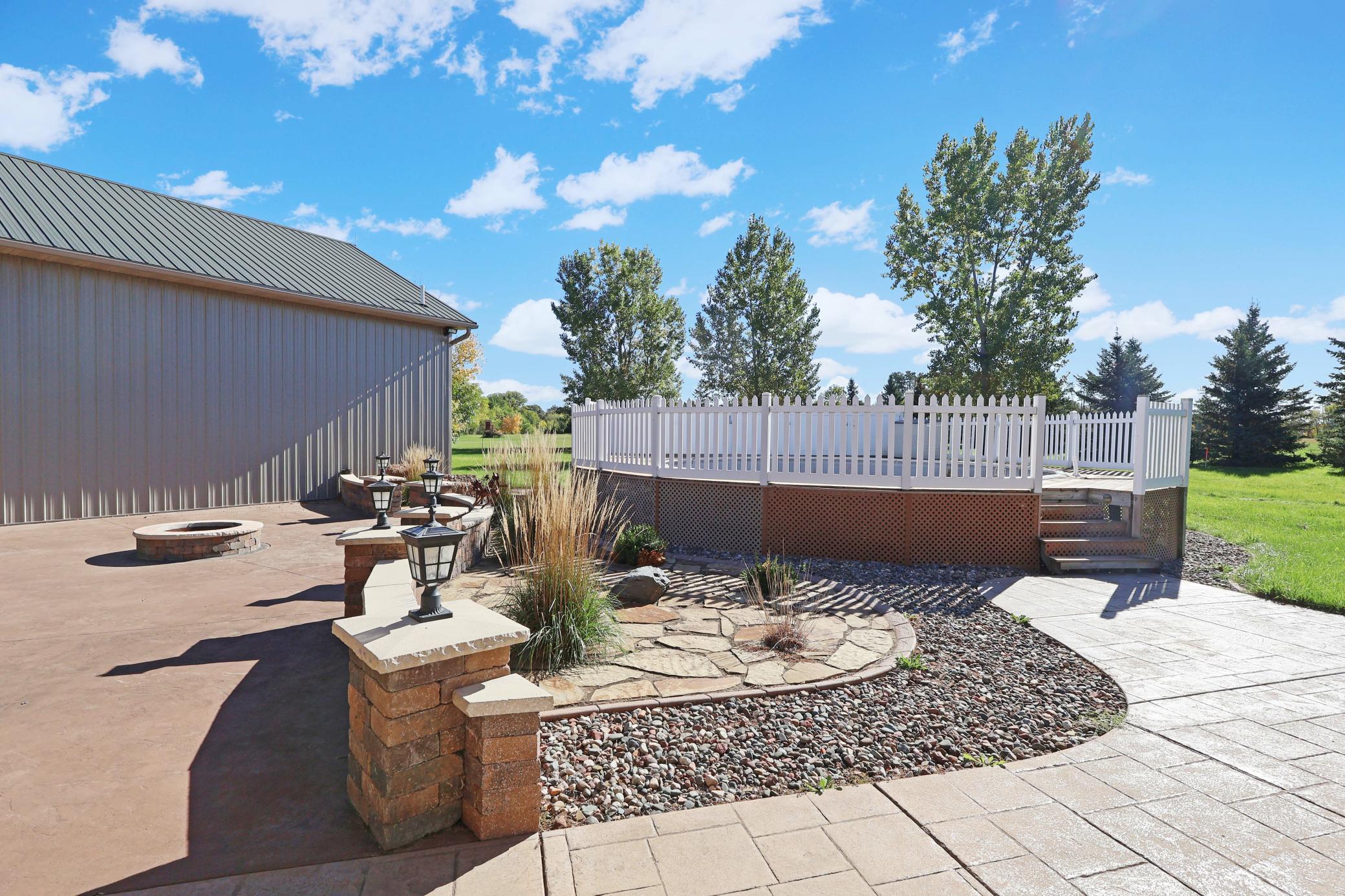 Lots of great landscape around the home- and a maintenance free deck to the future pool area, just needs a liner.