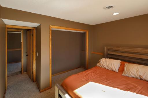The lower level 3rd bedroom features an extra deep closet and recessed lighting.