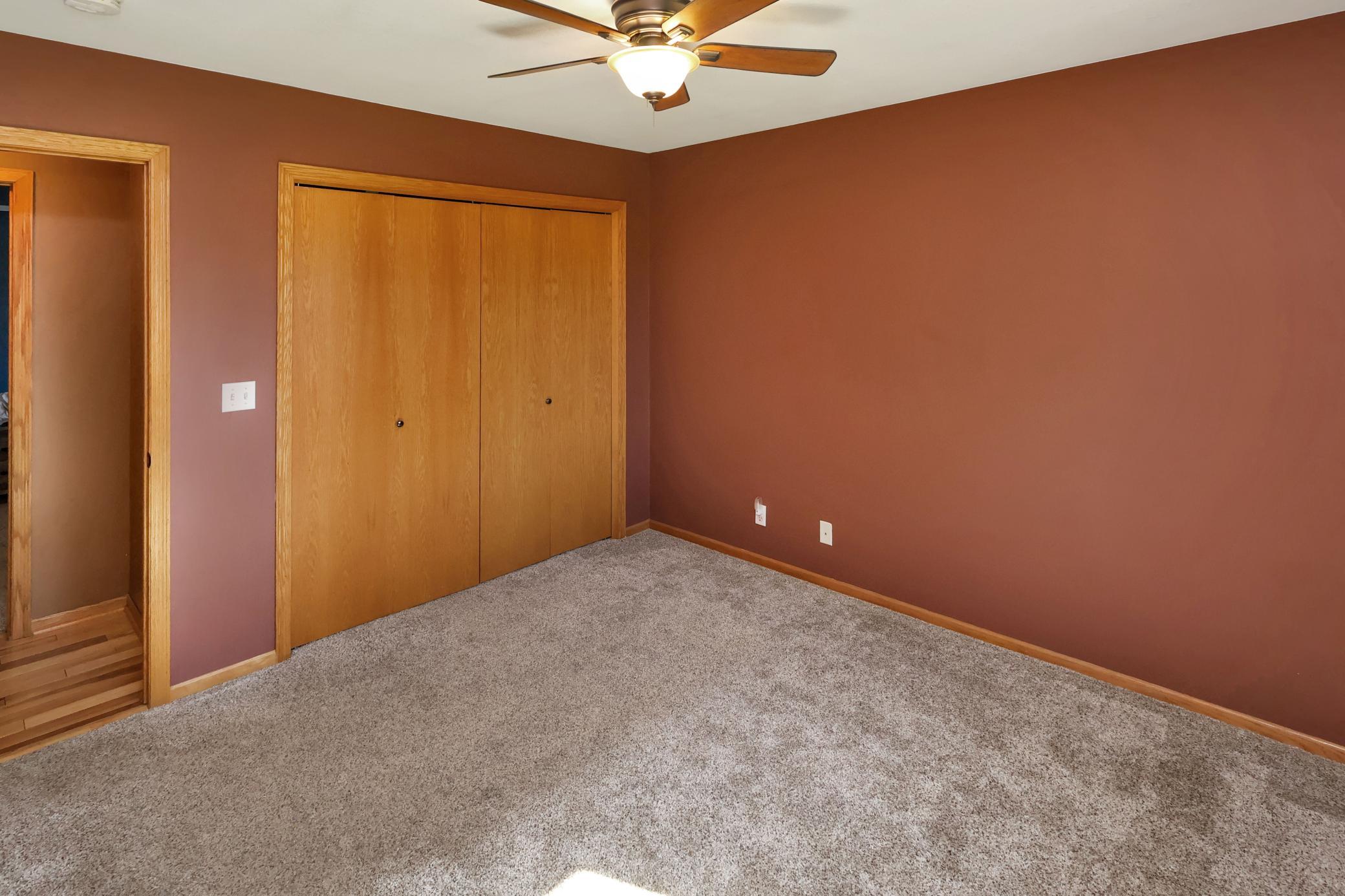 The primary bedroom closet is deeper than standard offering additional storage space.