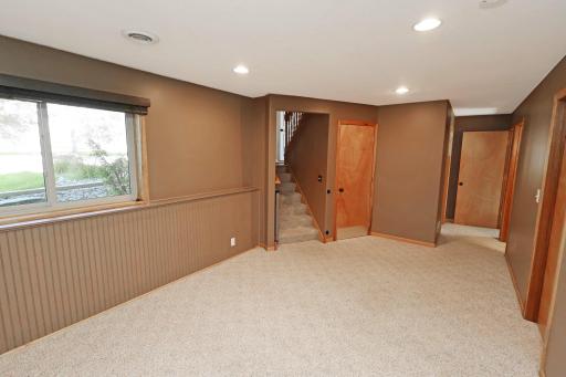 Two additional bedrooms a full bath and the under the stair storage off the family room.