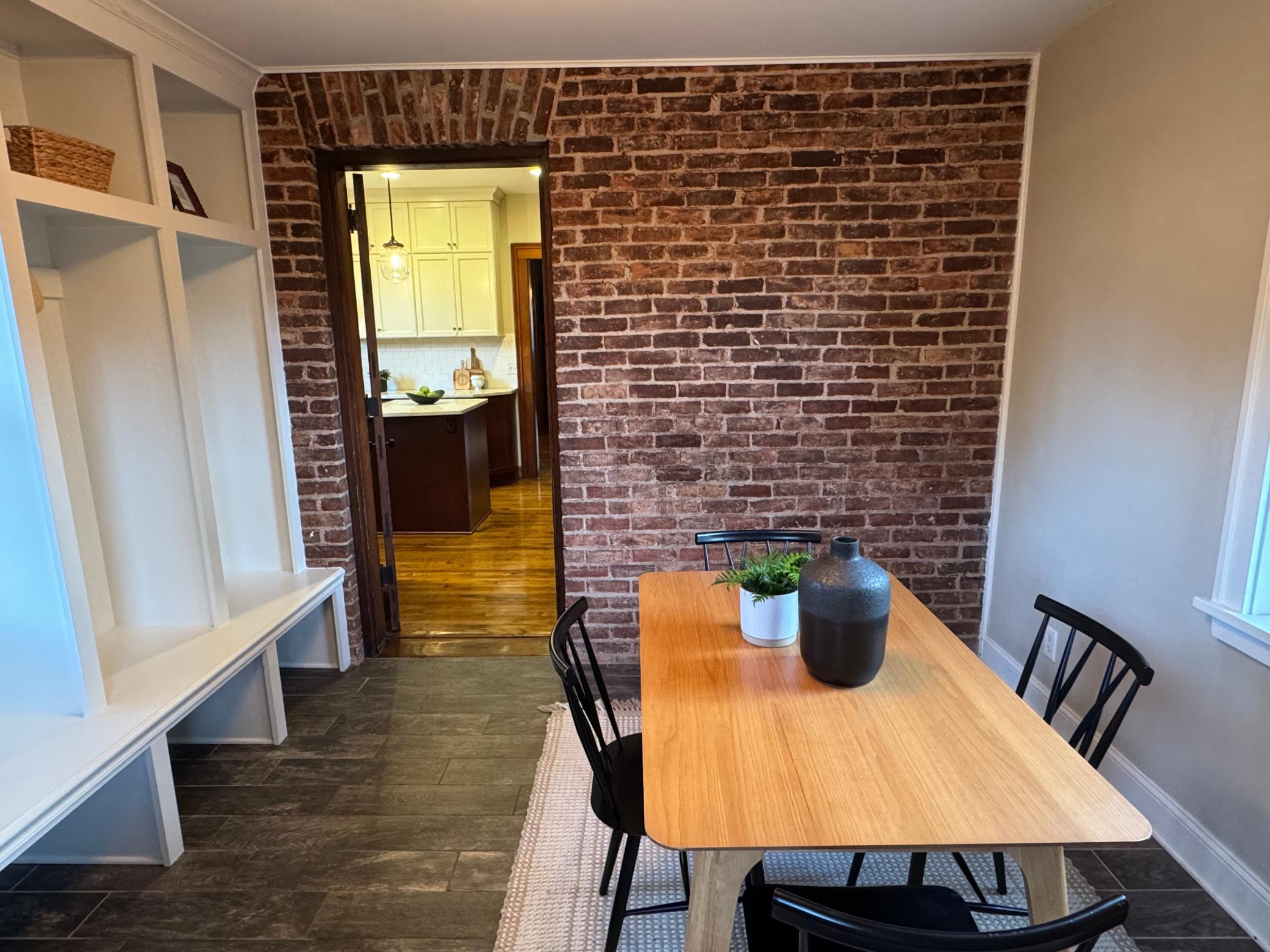 Exposed brick adds character and charm to the home!