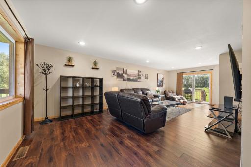 The living room is on the left upon entry into the home from the front door and porch.
