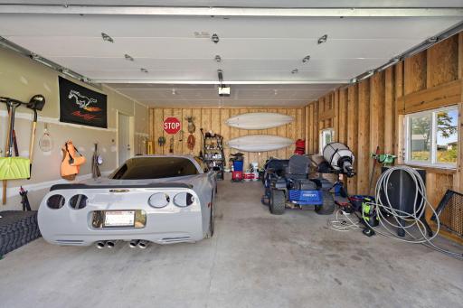 The two car garage has space for your vehicles and lawn equipment.