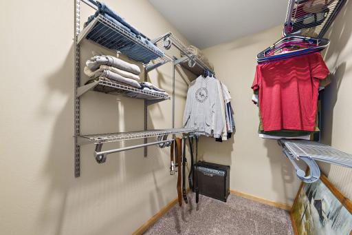 The primary bedroom features a walk-in closet with plenty of storage space for all your personal items and clothes.