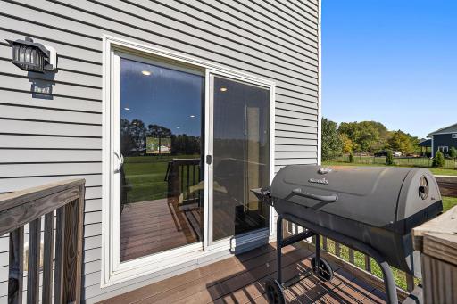 The back stoop has space enough for grilling out with immediate access to the living room.