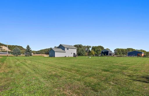 A view of the back of the home from the corner of the lot.