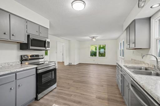 Kitchen with new appliances looking into the Dining Room