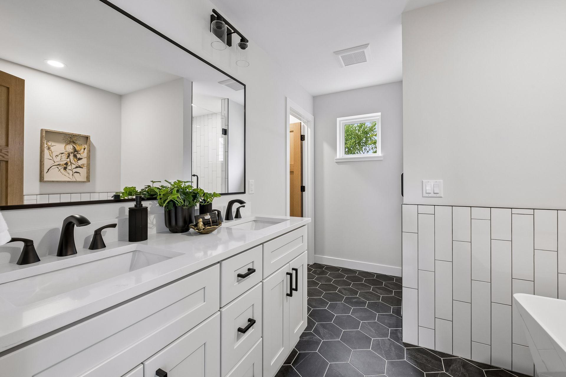 Spa-like primary bathroom with separate walk-in shower and soaker tub