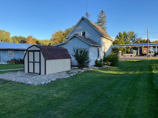 Plenty of parking around the back asphalt driveway.jpg