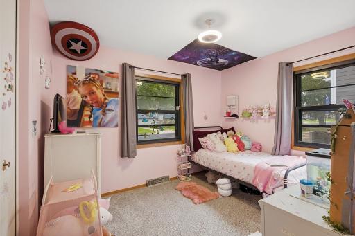 Bedroom 2. Fun and cute! carpet is only 2 years old.
