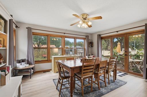 This Dining room is Simply Amazing! 3 sides of windows and natural light!