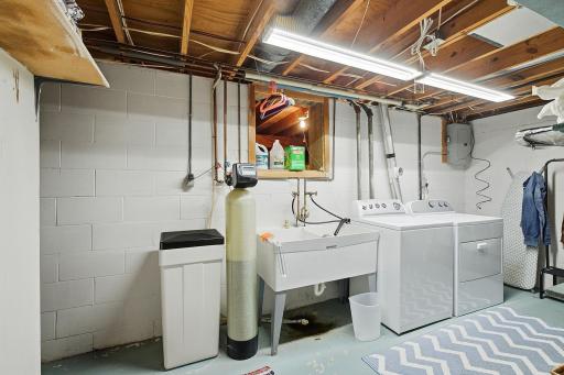Laundry area. Also has water softener (Owned) and a radon mitigation system already installed.