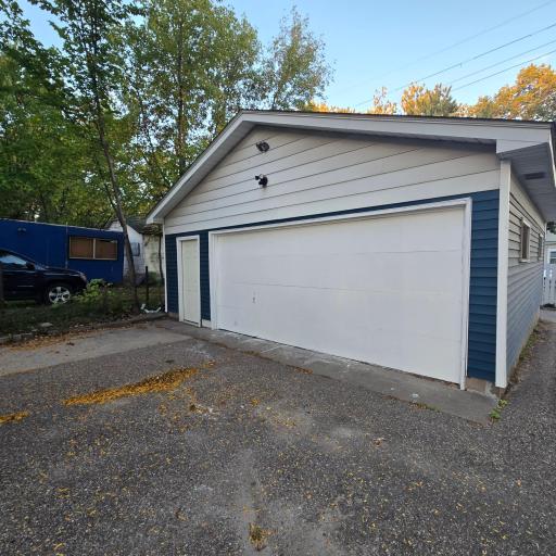 Over-sized two car detached garage measures 24'x26".