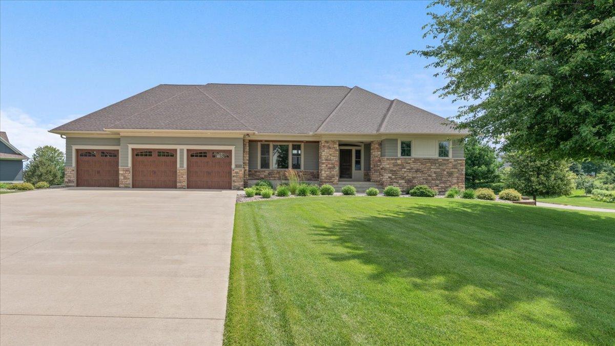 Beautifully maintained yard with in-ground sprinkler system.