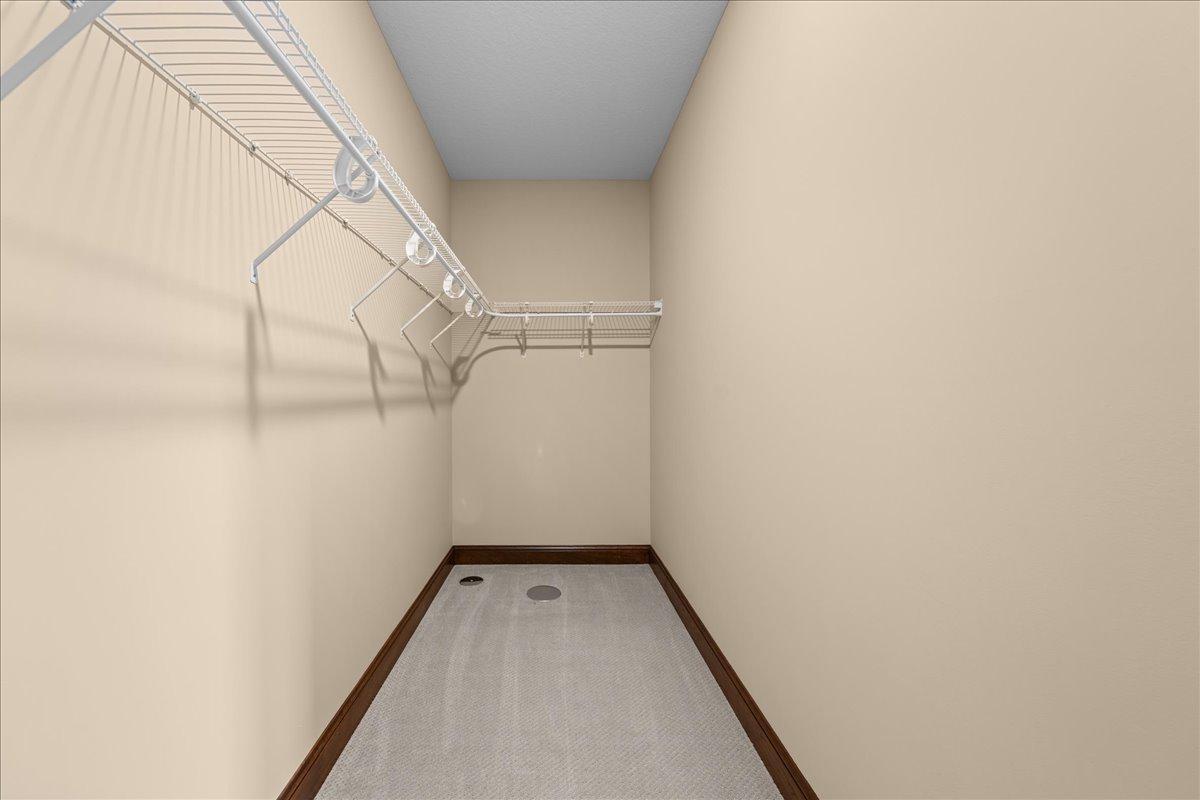 Lower level bedroom walk-in-closet.