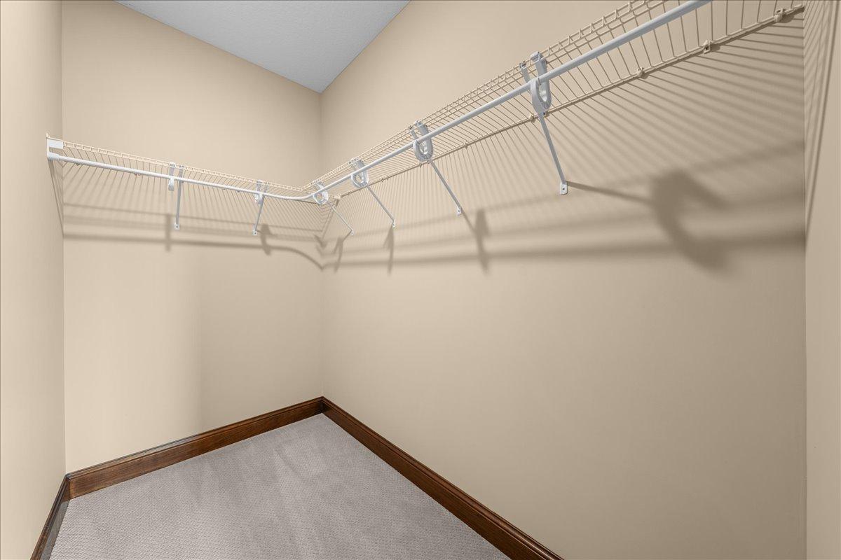 Walk-in-closet for 2nd lower level bedroom.