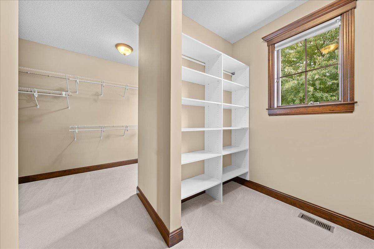 Plenty of shelving in your walk-in-closet.